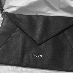Lou•jo envelope style purse with wrist attachment